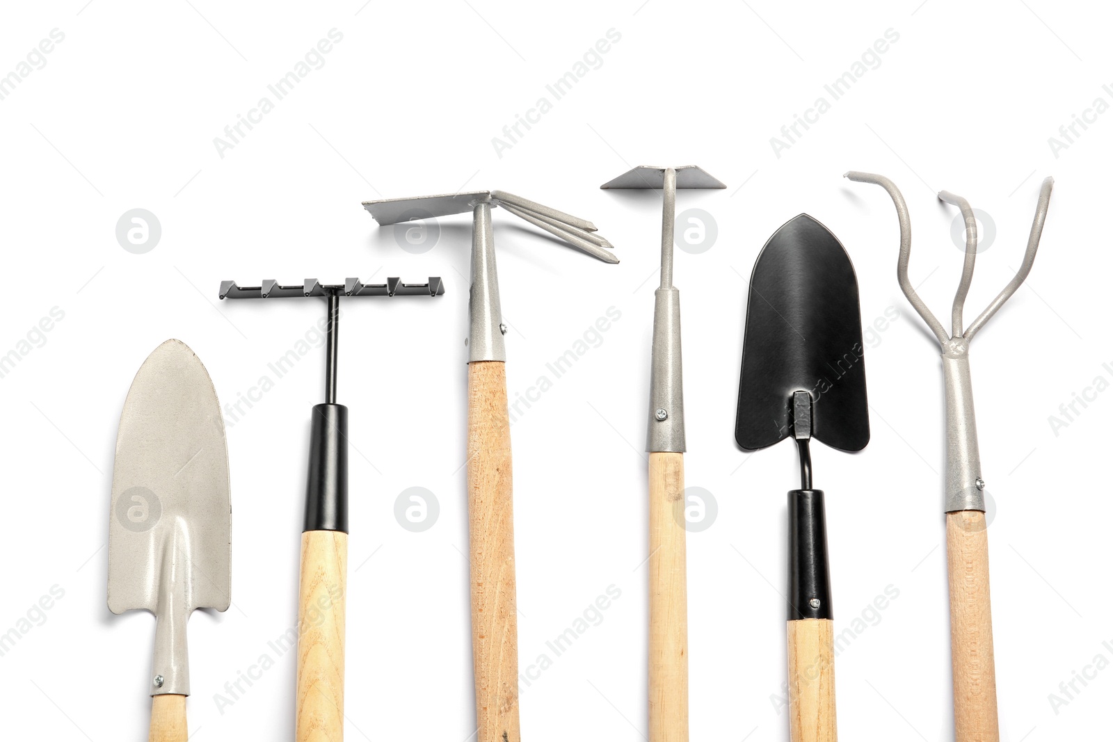 Photo of Set of gardening tools on white background, top view