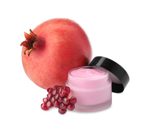 Photo of Fresh pomegranate and jar of facial mask on white background. Natural organic cosmetics