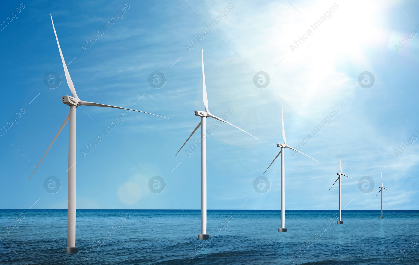 Image of Floating wind turbines installed in sea. Alternative energy source 