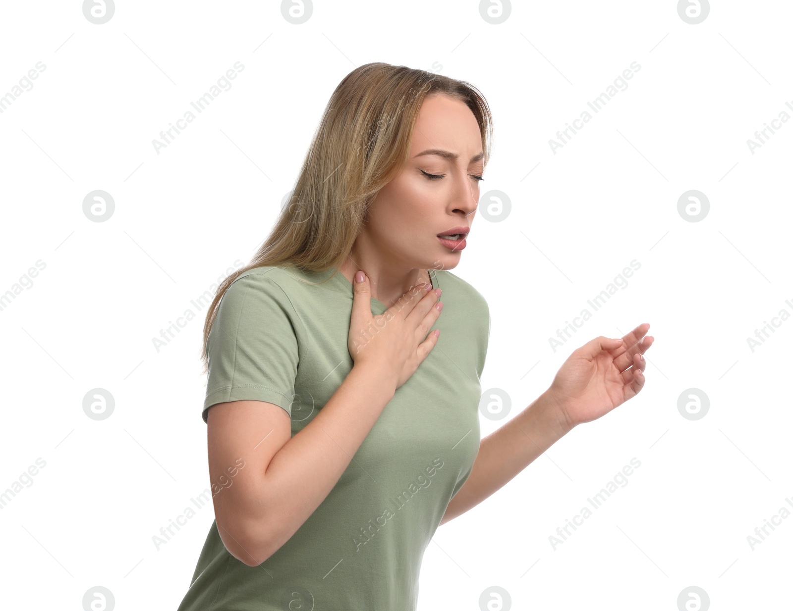 Photo of Young woman suffering from pain during breathing on white background