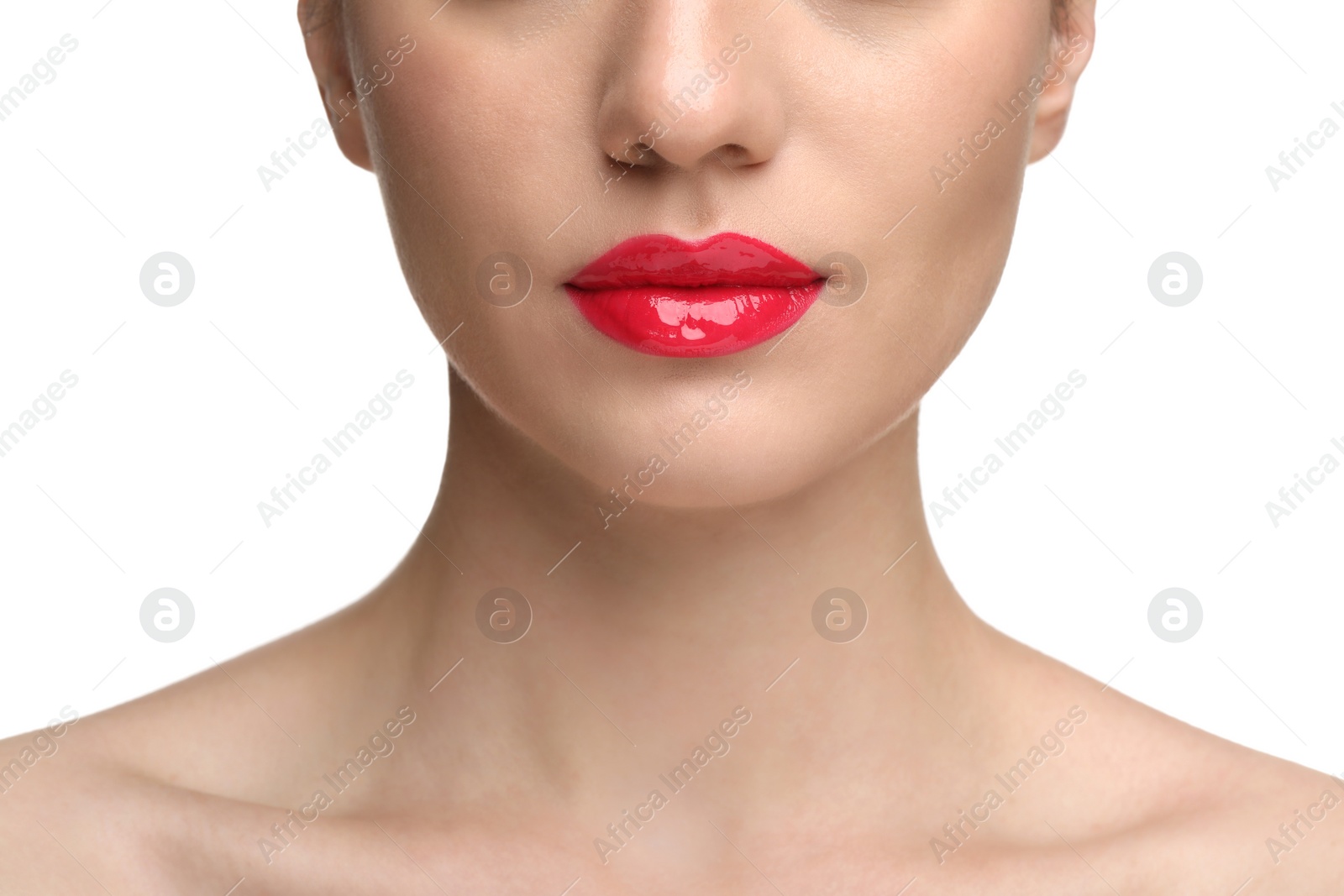 Photo of Woman with bright lip gloss on white background, closeup