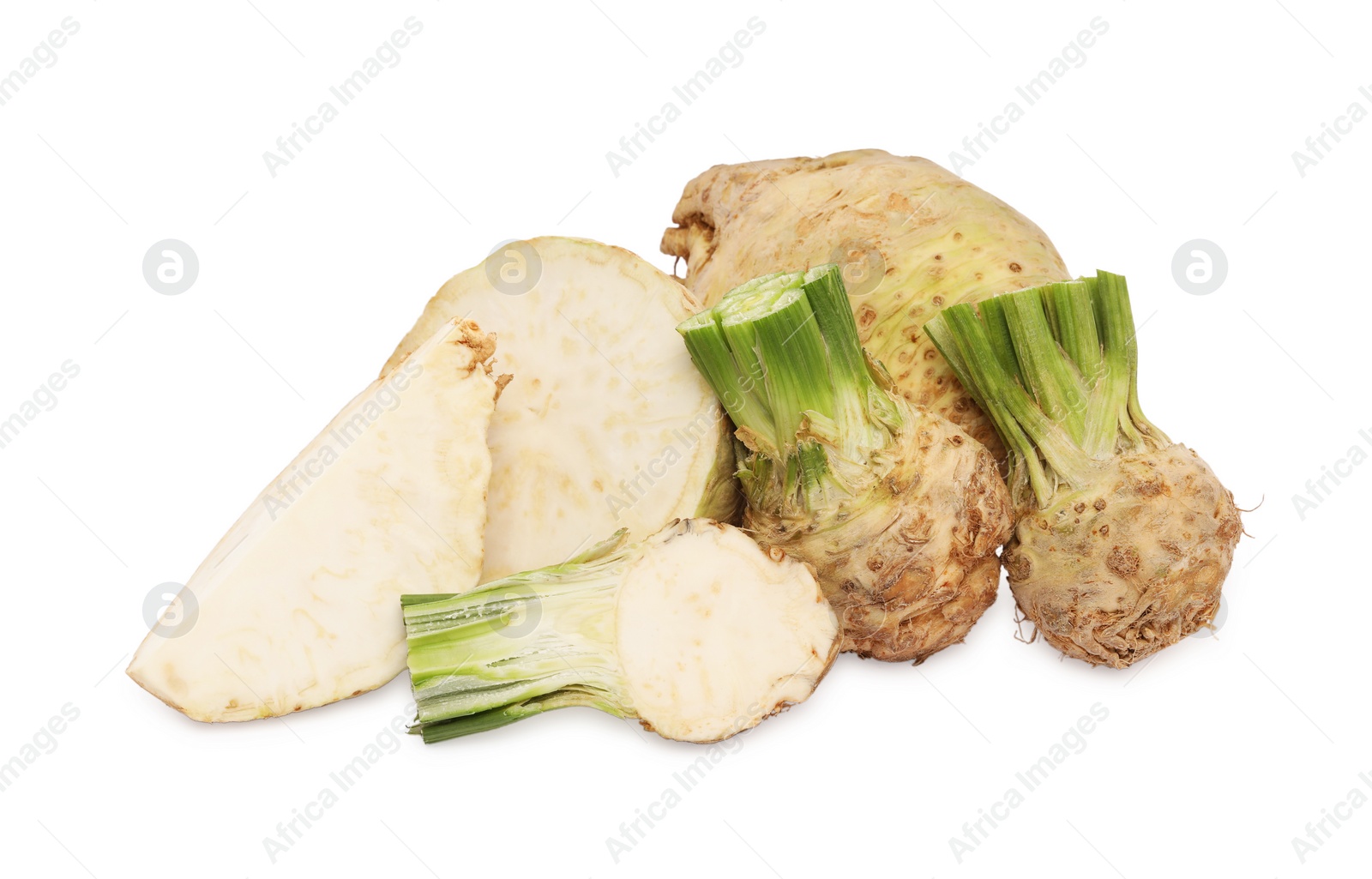 Photo of Whole and cut celery roots isolated on white