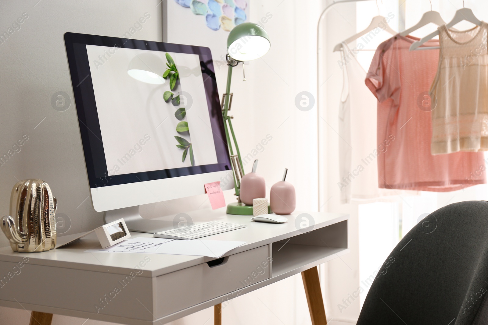 Photo of Designer's workplace with modern computer on table