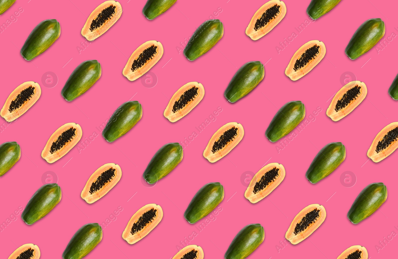Image of Pattern of whole and halved papaya fruits on pink background