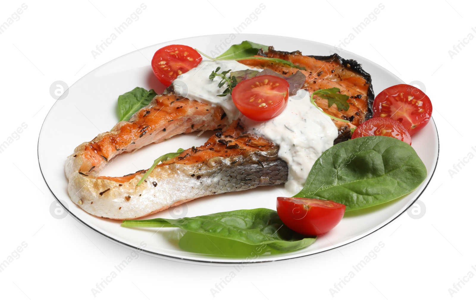 Photo of Tasty salmon steak with basil and tomatoes on white background