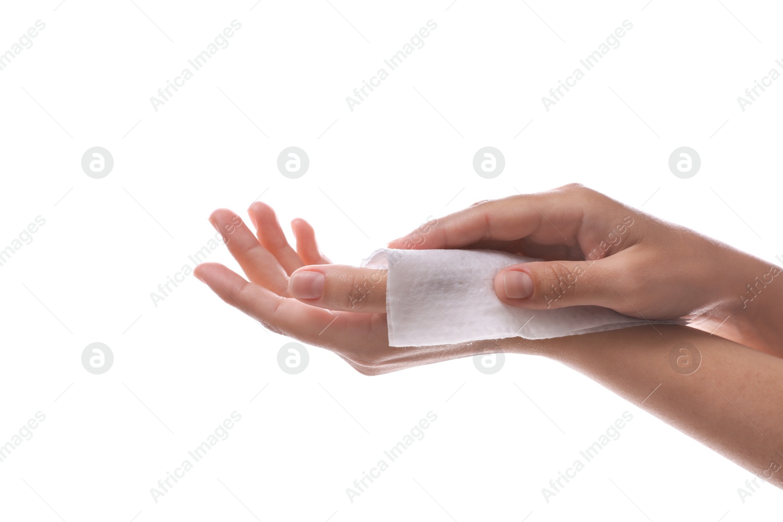 Photo of Woman cleaning hand with wet wipe on white background, closeup