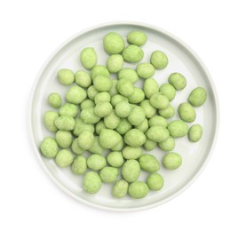 Photo of Plate with wasabi coated peanuts on white background, top view