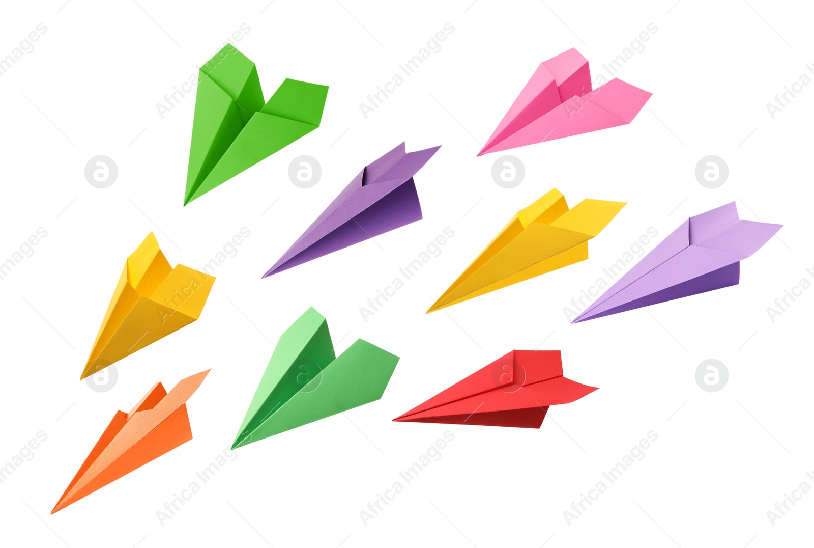 Image of Set with handmade different color paper planes on white background