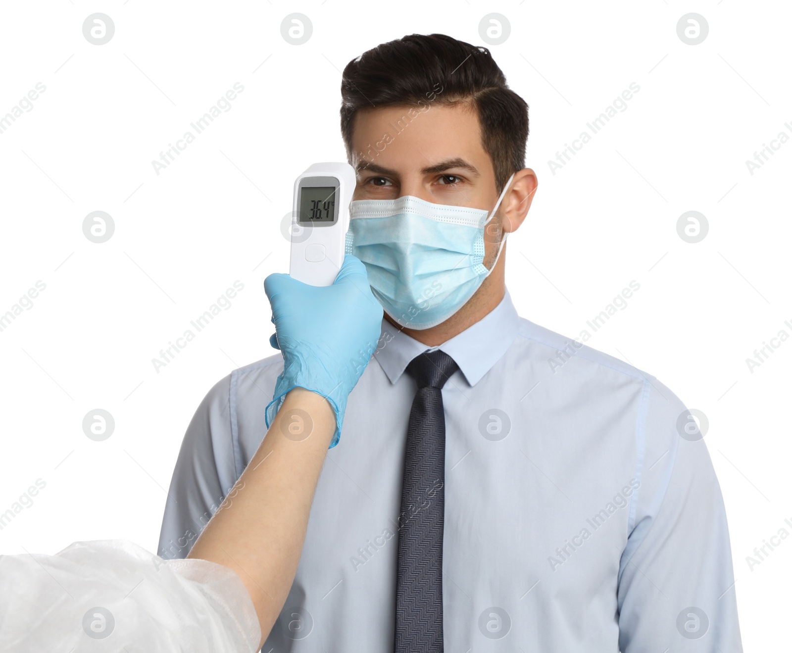 Photo of Doctor measuring man's temperature on white background, closeup. Prevent spreading of Covid-19