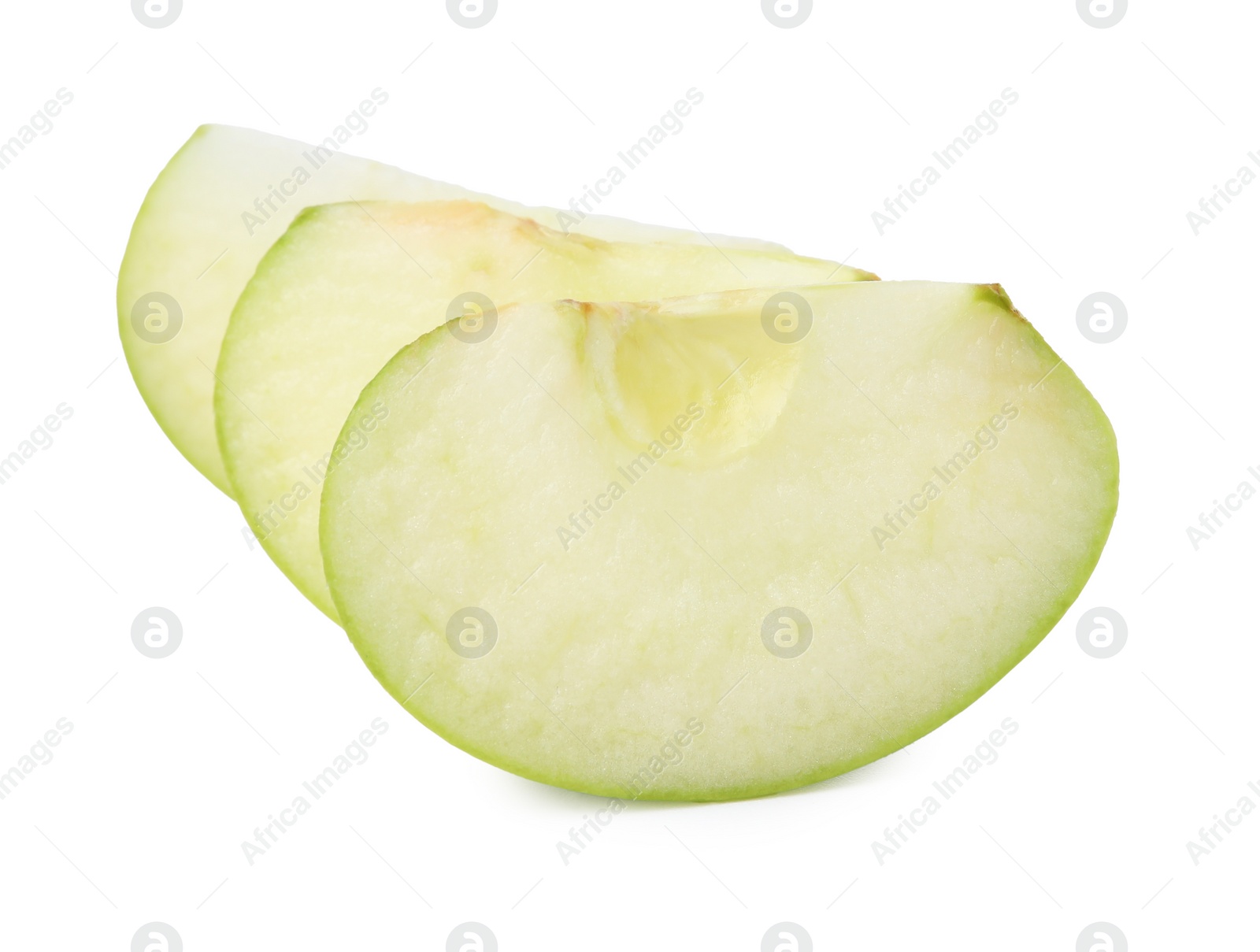 Photo of Slices of ripe green apple isolated on white