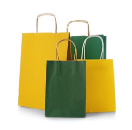 Photo of Mockup of paper shopping bags on white background