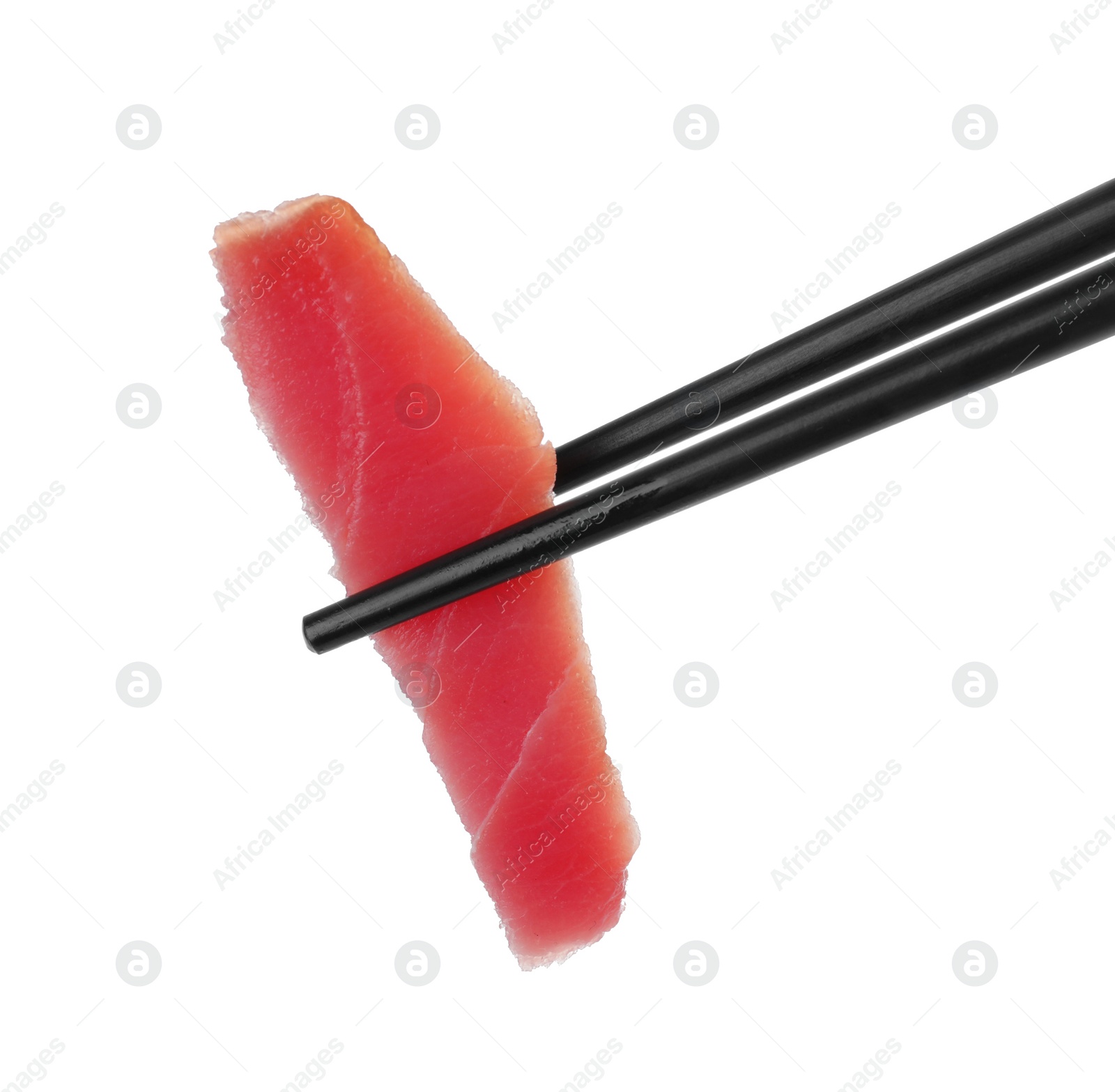 Photo of Chopsticks with tasty sashimi (piece of fresh raw tuna) isolated on white