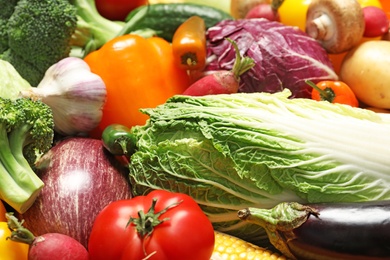 Photo of Many different fresh vegetables as background, closeup