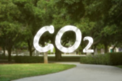 Image of Concept of clear air. CO2 inscription and beautiful park