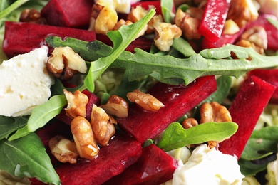 Photo of Tasty healthy beets salad, close up view