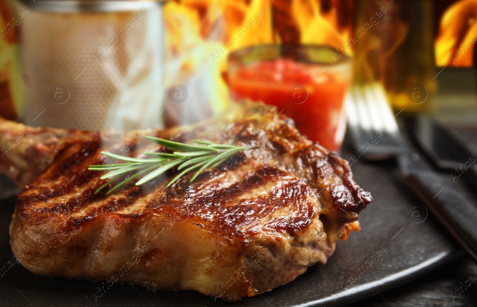 Image of Tasty grilled beef steak on table, closeup