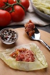 Photo of Ingredients for preparing stuffed cabbage rolls on table