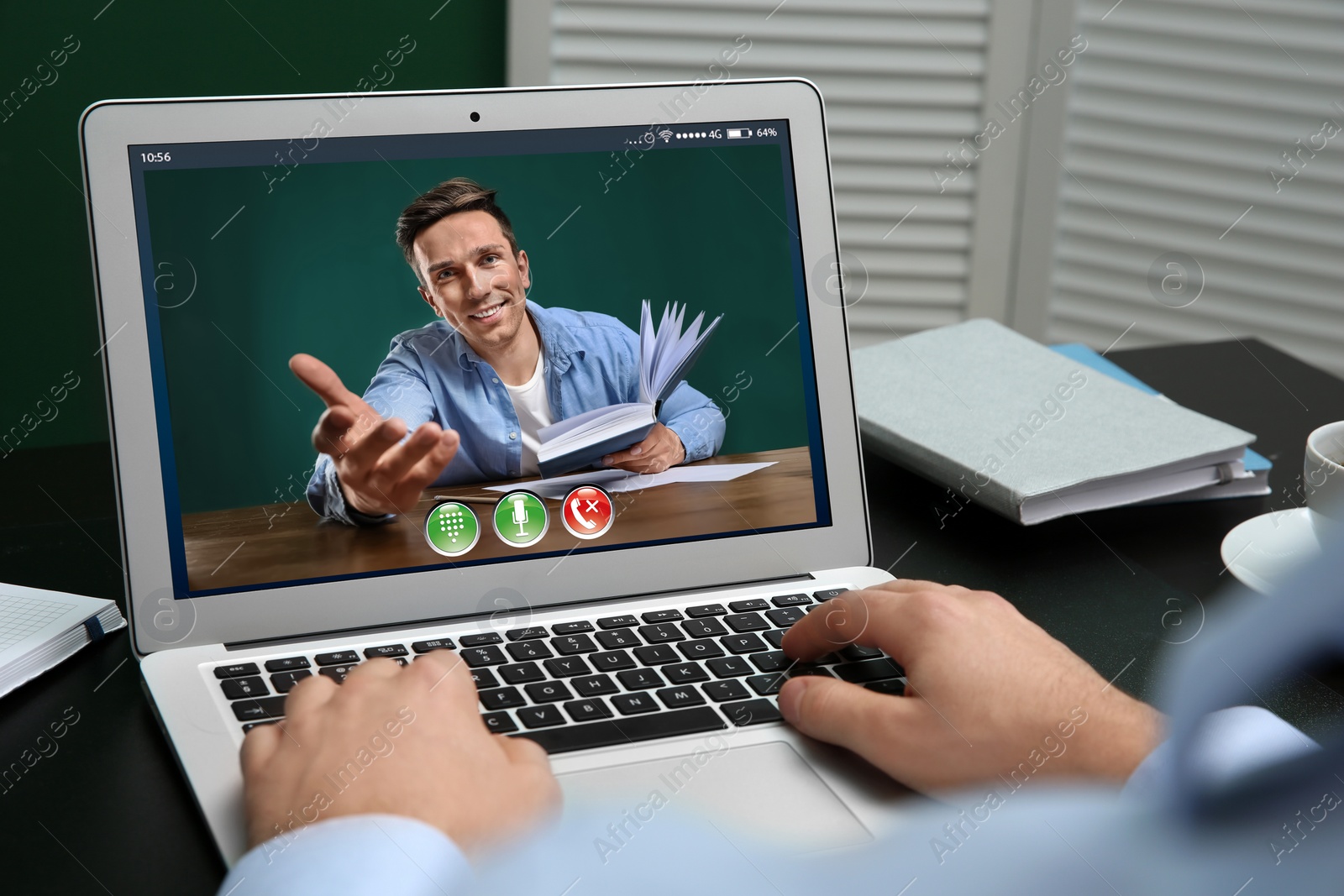 Image of Distance learning, online school lesson. Boy studying at home during quarantine and lockdown due to Covid-19 pandemic, closeup