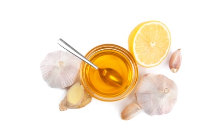 Photo of Composition with garlic and other cold remedies on white background, top view