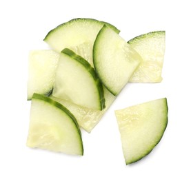 Pile of fresh cut cucumber isolated on white, top view