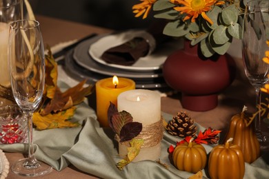 Photo of Beautiful autumn place setting and decor for festive dinner on table