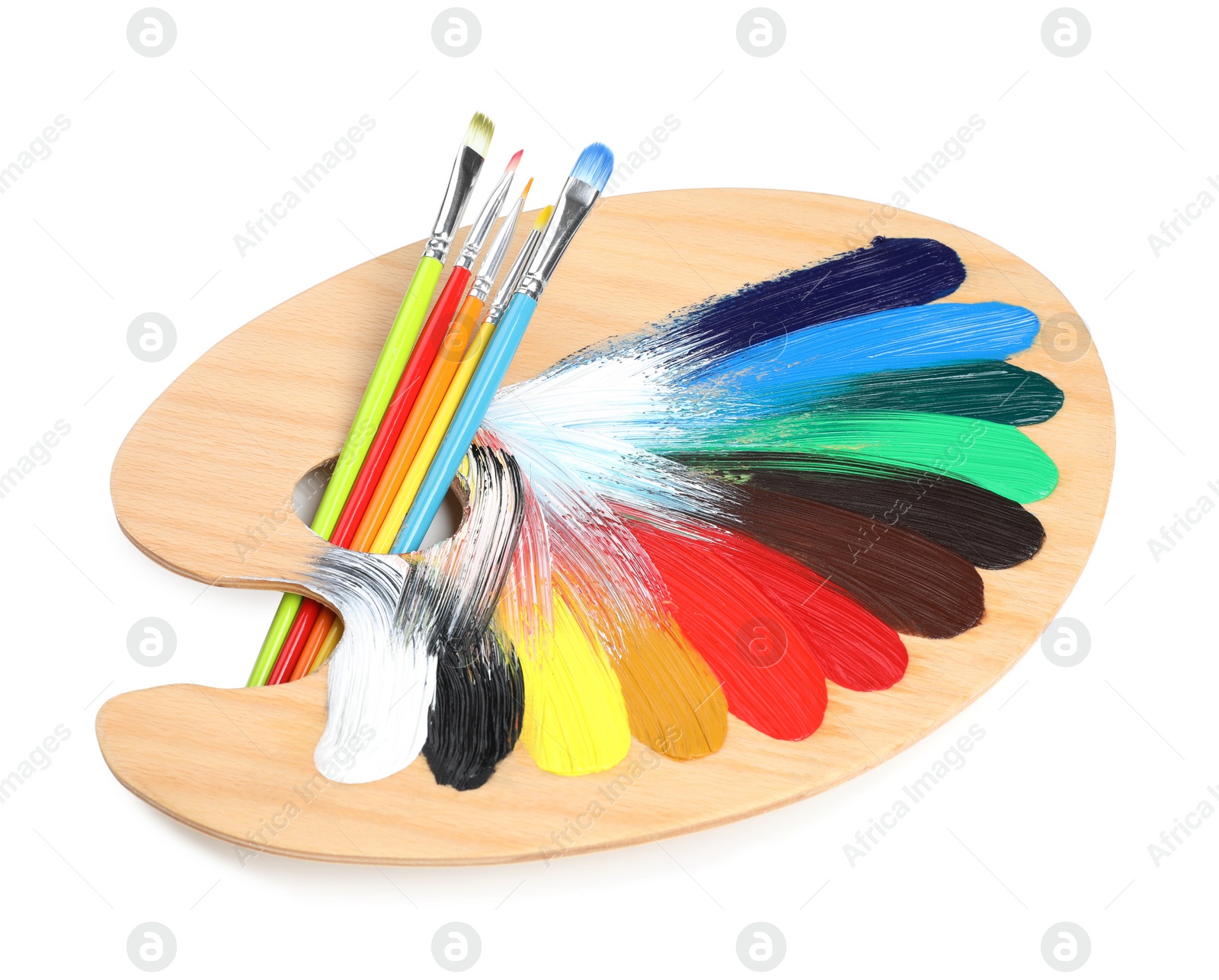 Photo of Palette with paints and brushes on white background. Artist equipment