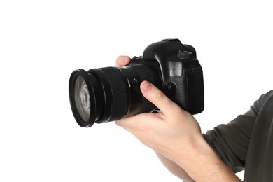 Photographer holding modern camera on white background, closeup