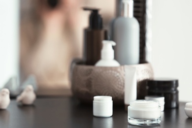 Photo of Set of body care cosmetics on table