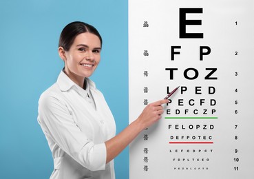 Ophthalmologist pointing at vision test chart on light blue background