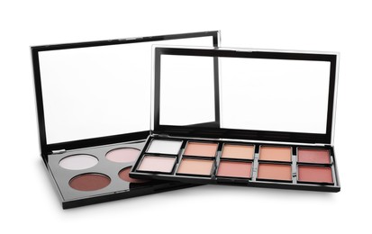 Colorful contouring palettes on white background. Professional cosmetic products