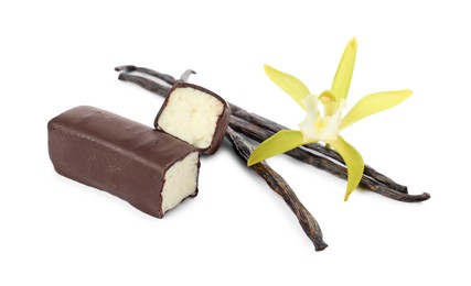 Photo of Glazed curd cheese bars, vanilla pods and flower isolated on white