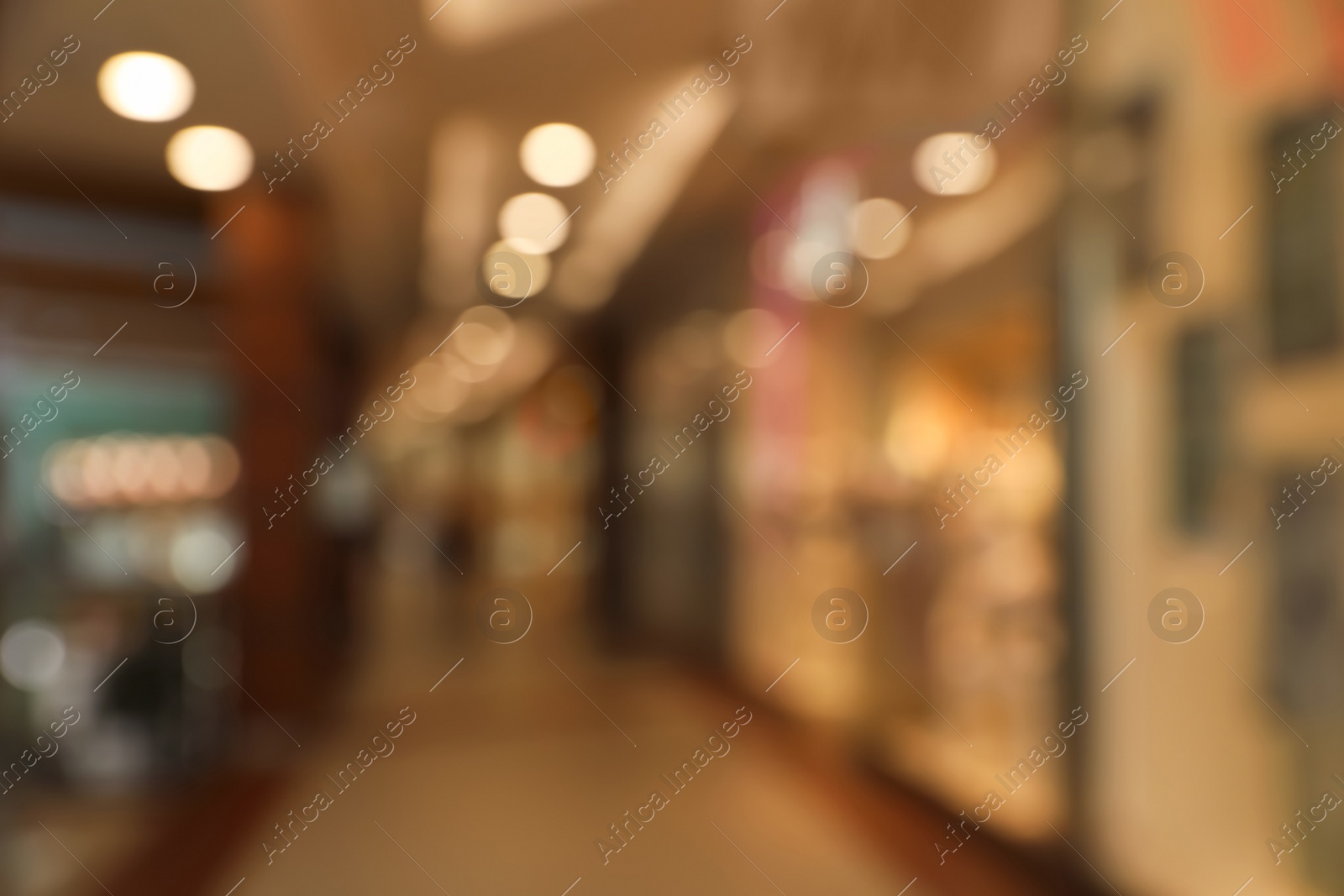 Photo of Blurred view of shopping mall interior. Bokeh effect