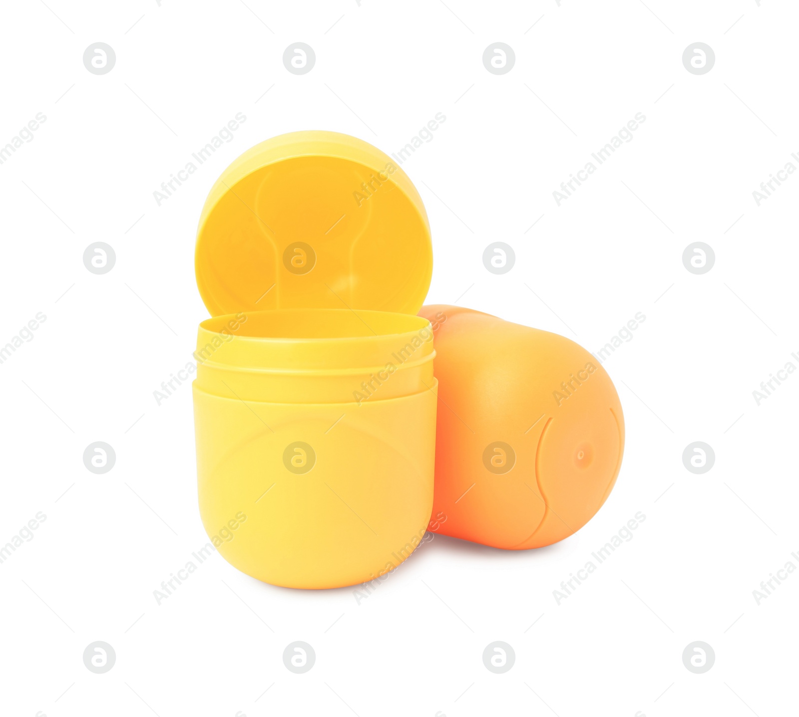 Photo of Slynchev Bryag, Bulgaria - May 23, 2023: Yellow plastic capsules from Kinder Surprise Eggs on white background