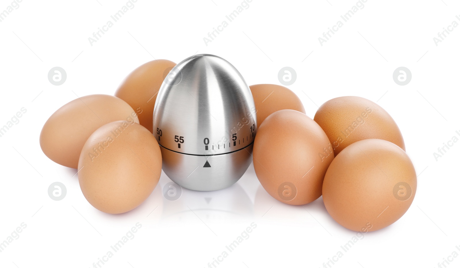 Photo of Kitchen timer and chicken eggs on white background