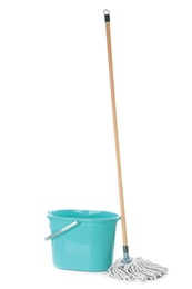 Photo of Mop and plastic bucket on white background. Cleaning supplies