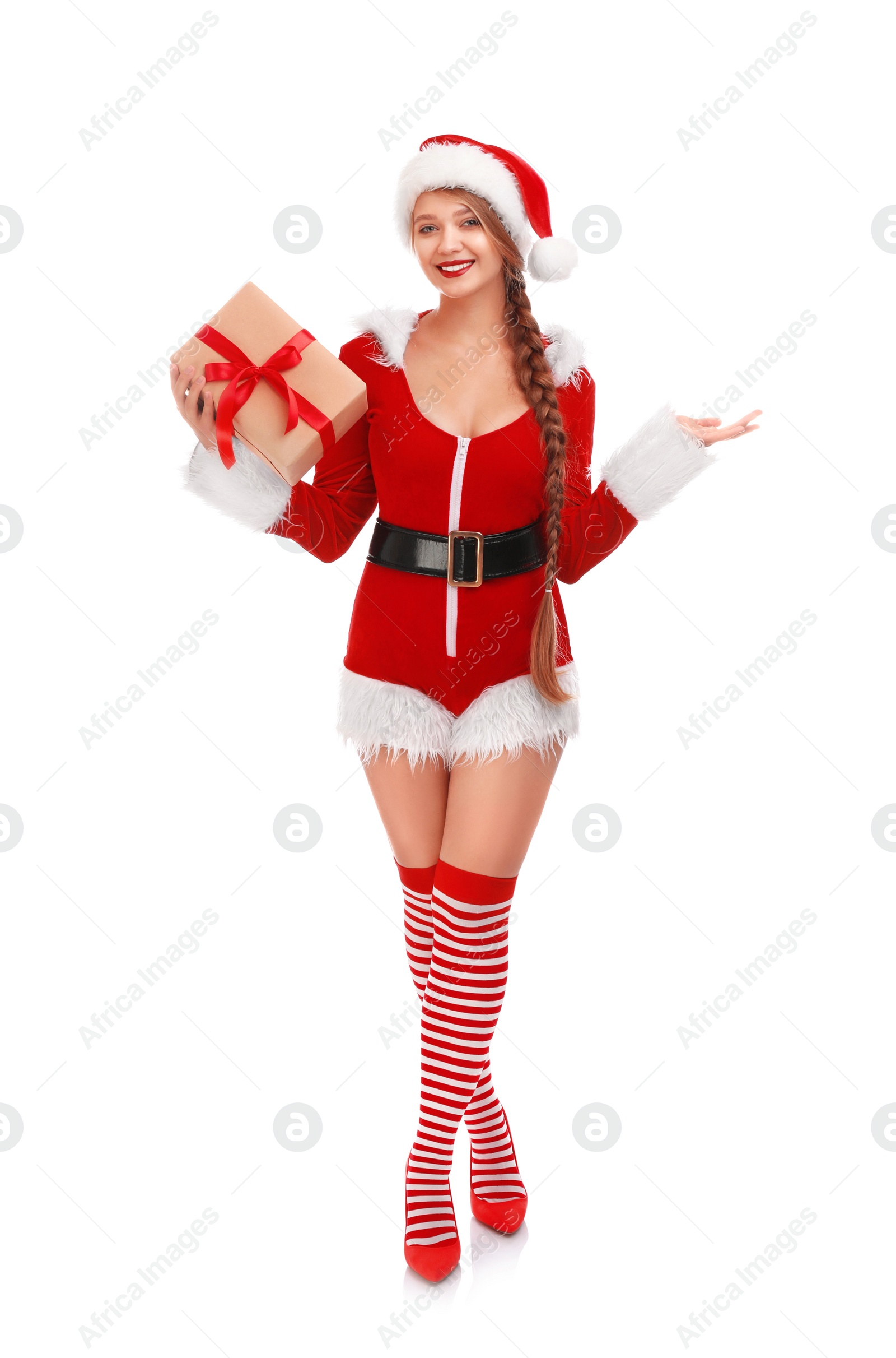 Photo of Beautiful Santa girl with Christmas gift on white background