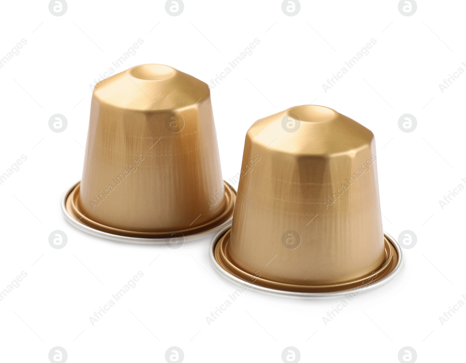 Photo of Two plastic coffee capsules isolated on white