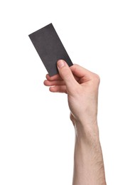 Man holding blank business card on white background, closeup