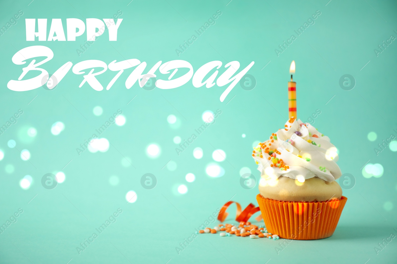Image of Delicious cupcake with candle on light green background. Happy Birthday