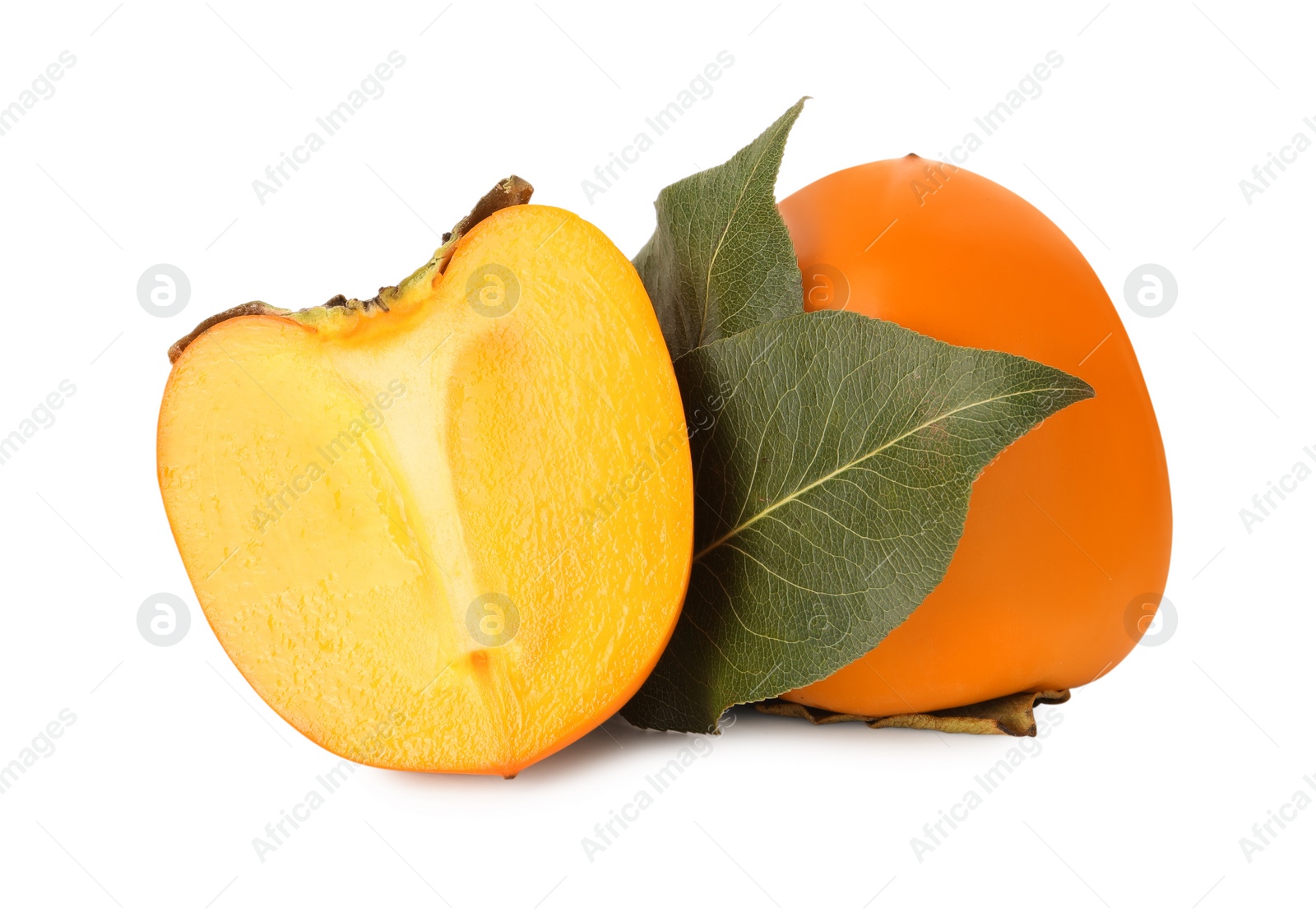 Photo of Whole and cut delicious ripe juicy persimmons on white background