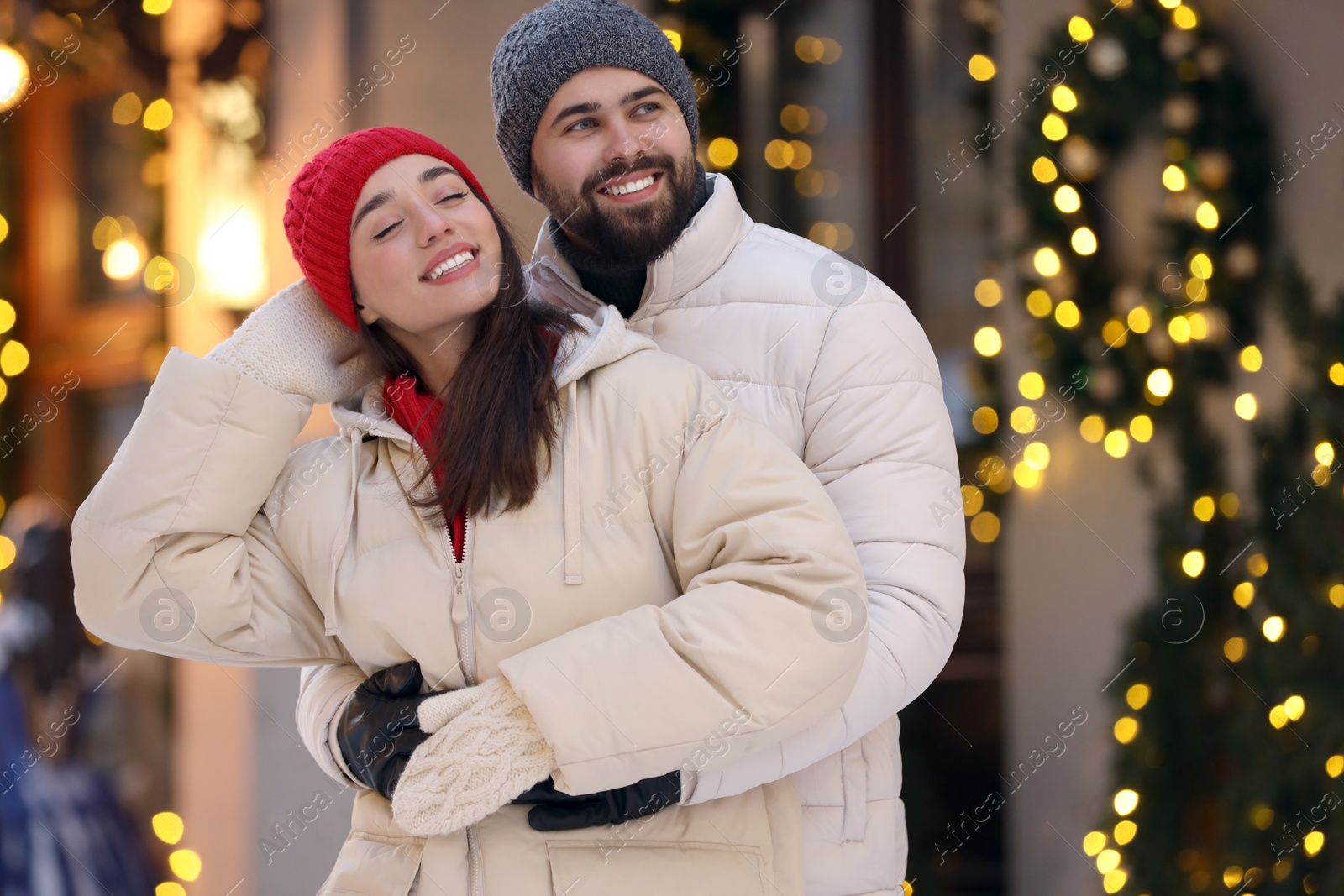 Photo of Lovely couple spending time together on city street