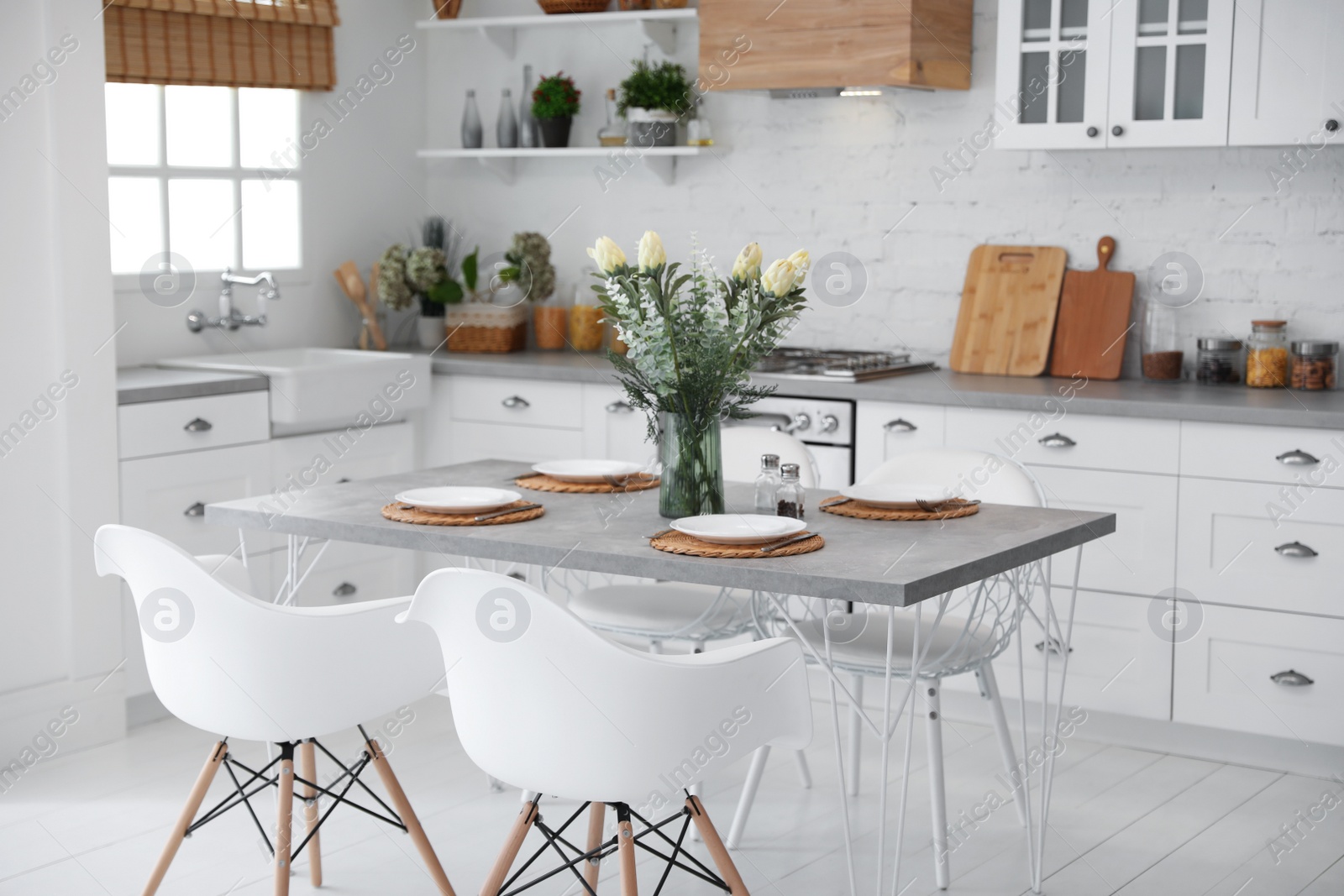 Photo of Beautiful kitchen interior with new stylish furniture