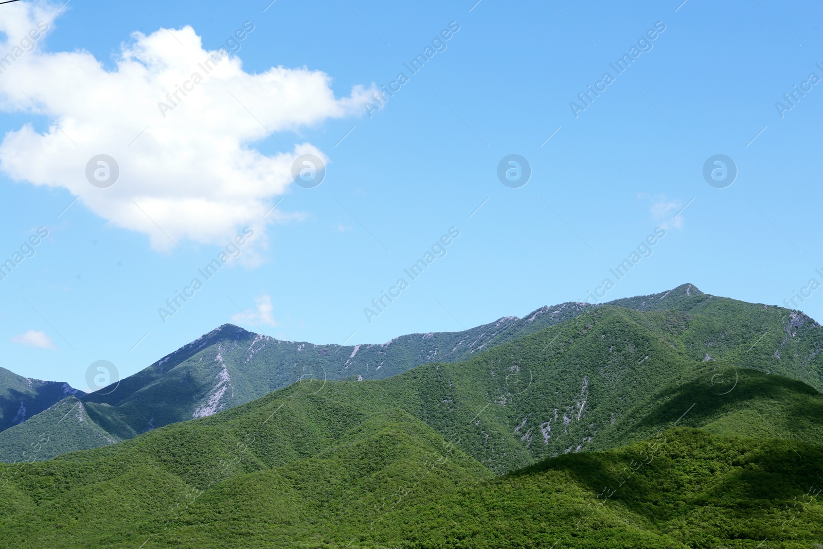 Photo of Picturesque view of beautiful mountains and blue sky