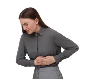 Woman suffering from stomach pain on white background