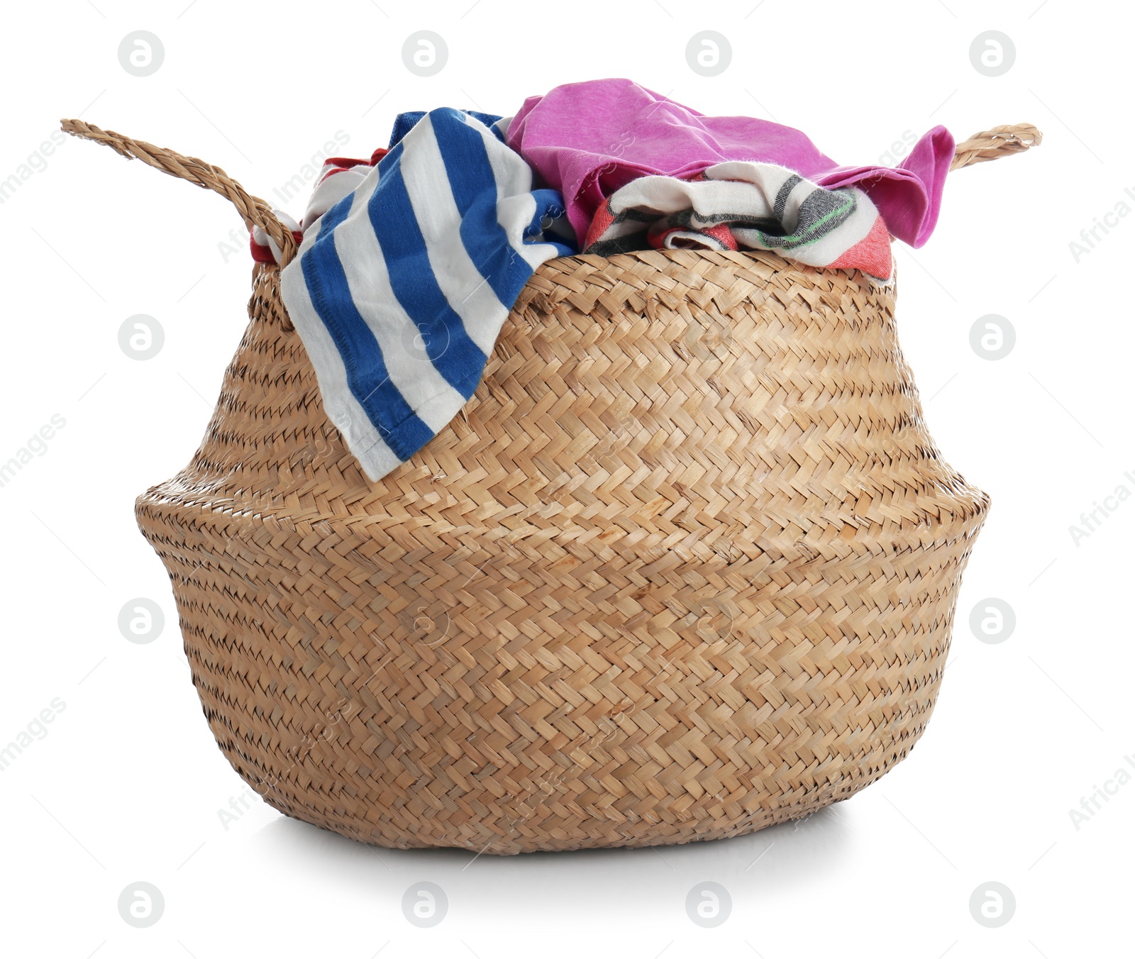 Photo of Wicker laundry basket with kitchen towels isolated on white