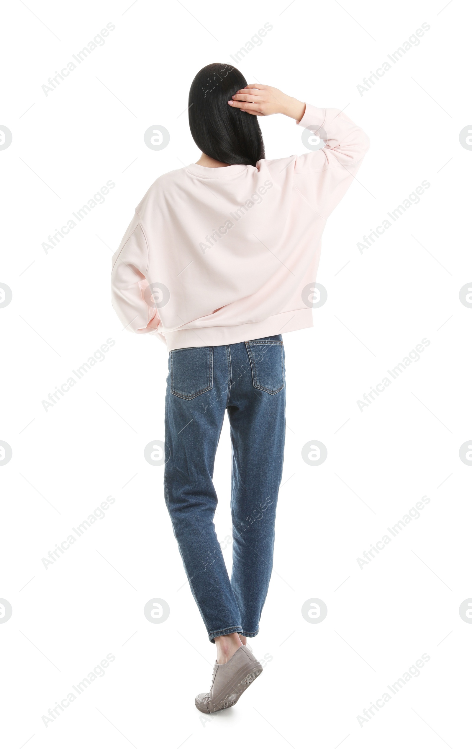 Photo of Young woman in sweater isolated on white. Mock up for design