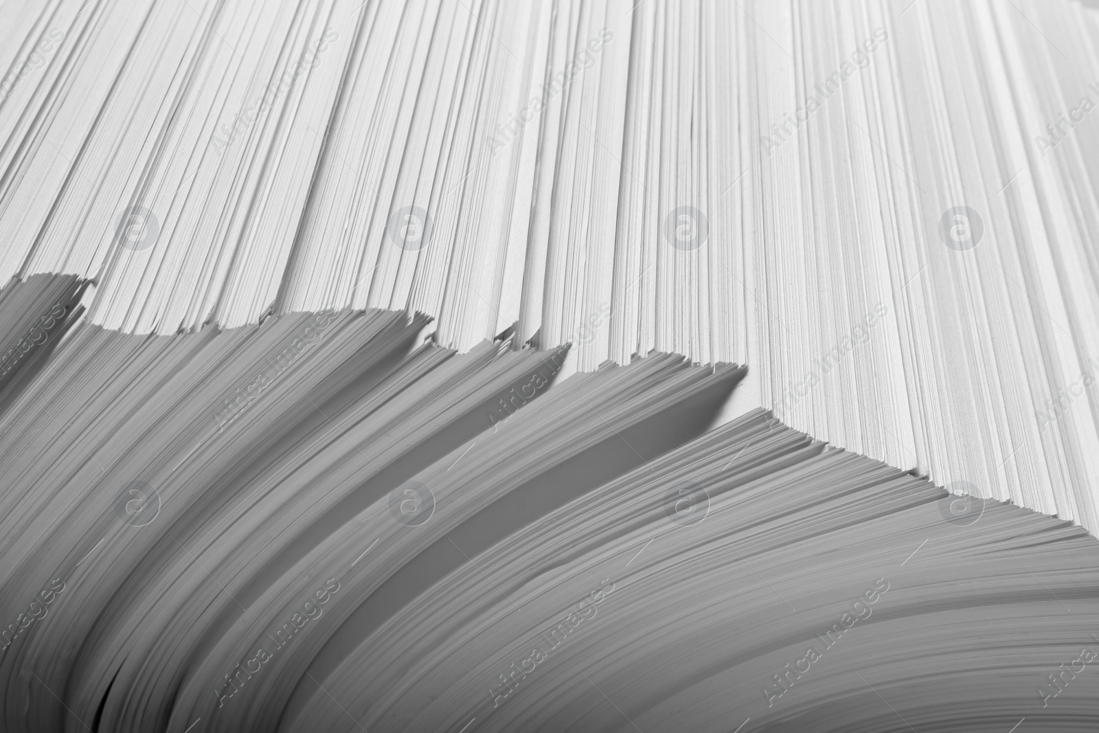 Photo of White paper sheets as background, closeup view