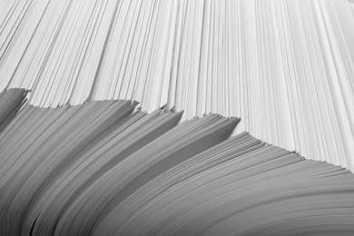 Photo of White paper sheets as background, closeup view