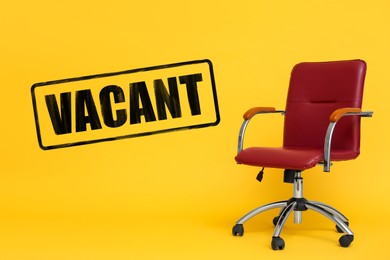 Image of Red office chair and word VACANT on yellow background