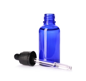 Photo of Cosmetic bottle and pipette with essential oil on white background